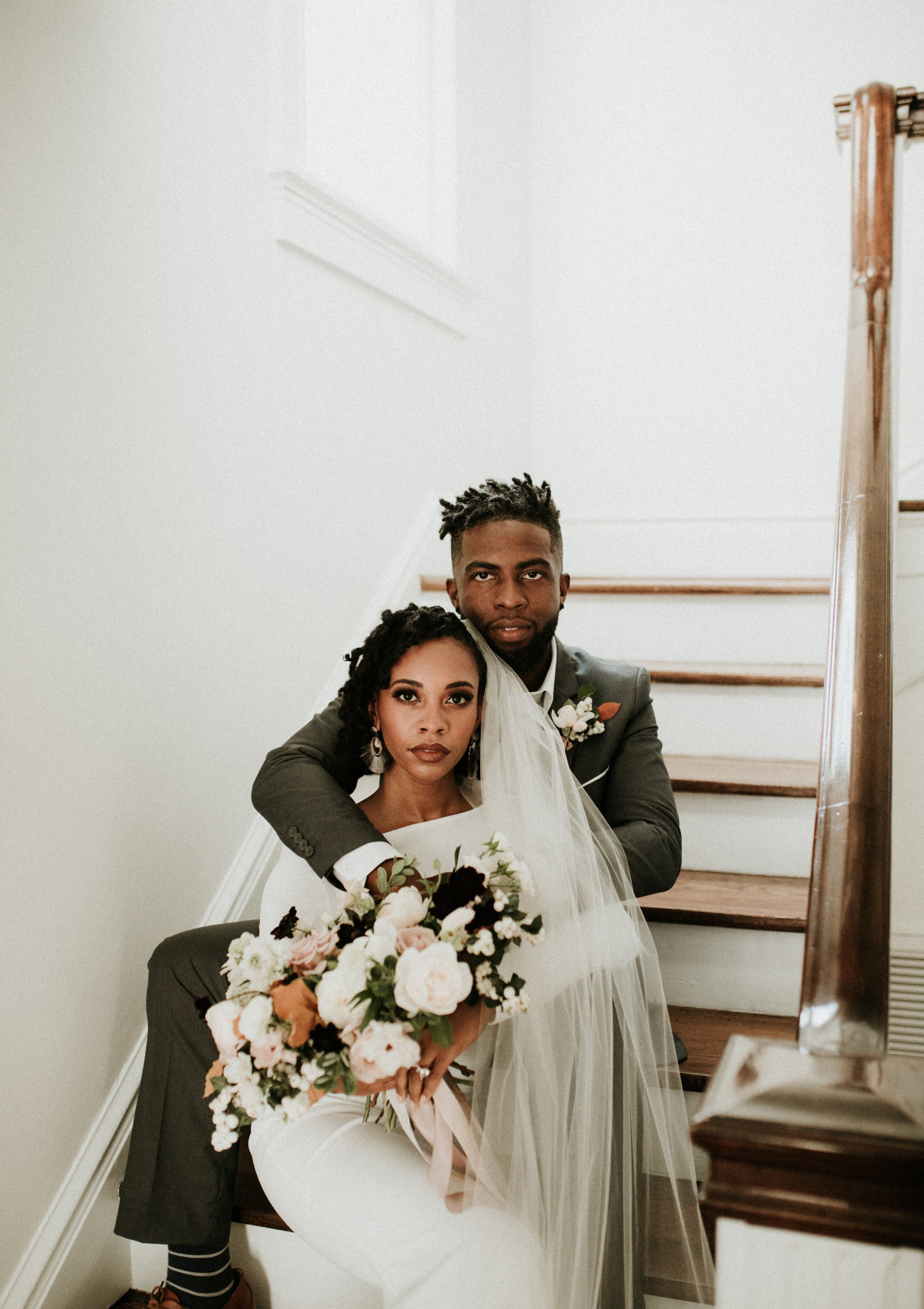 bride and groom photo on stairs